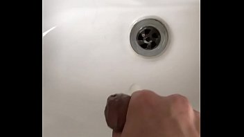 Kahaz cum from sex with his hand and flushed his cum down the bathroom sink
